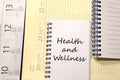 Health and wellness write on notebook