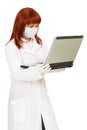 Health worker uses laptop for work Royalty Free Stock Photo