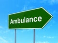 Healthcare concept: Ambulance on road sign background Royalty Free Stock Photo