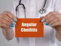Healthcare concept about Angular Cheilitis with sign on the sheet Royalty Free Stock Photo