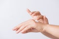 Healthcare concept. Closeup shot of young woman hands applying moisturizing hand cream Royalty Free Stock Photo