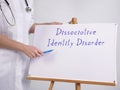 Healthcare concept about Dissociative Identity Disorder with inscription on the piece of paper