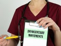 Healthcare concept meaning INVOLUNTARY MOVEMENTS with sign on the piece of paper