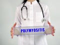 Healthcare concept meaning POLYMYOSITIS with phrase on the piece of paper Royalty Free Stock Photo