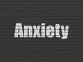 Healthcare concept: Anxiety on wall background