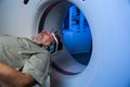 Senior male patient undergoing a MRI examination in a modern hospital Royalty Free Stock Photo