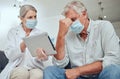 Healthcare, digital tablet and covid diagnosis by doctor and patient consulting at hospital. Medical, face mask and Royalty Free Stock Photo