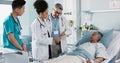 Healthcare, documents and a medical team of doctors checking on a patient in recovery or rehabilitation. Medicine Royalty Free Stock Photo