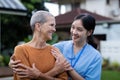 Healthcare, elderly woman with nurse or caregiver in home. Support or communication, caregiver and conversation with Royalty Free Stock Photo