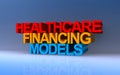 healthcare financing models on blue Royalty Free Stock Photo