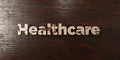 Healthcare - grungy wooden headline on Maple - 3D rendered royalty free stock image
