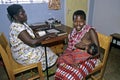 Healthcare, Maasai mother breastfeeding in clinic