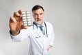 Healthcare and medical concept - doctor with pill in hospital Royalty Free Stock Photo