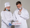 Discussion of two doctors in protective masks and gloves Royalty Free Stock Photo
