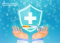 Healthcare and medicine concept. Doctor`s hands rising the medical shield and the vaccine in syringe against bokeh background. Royalty Free Stock Photo