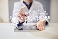 Healthcare mobile apps. Modern medical technology on virtual screen. Royalty Free Stock Photo