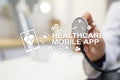 Healthcare mobile apps. Modern medical technology on virtual screen.