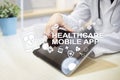 Healthcare mobile apps. Modern medical technology on virtual screen.