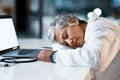 Healthcare, overtime and doctor sleeping at laptop, burnout and exhausted from research with mockup. Stress, sleep and Royalty Free Stock Photo