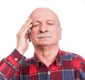 Healthcare, pain, stress and age concept. Sick old man. Senior man suffering from headach over white background