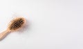 Healthcare problem concept. Hair loss or hair fall in comb on white background Royalty Free Stock Photo