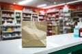 Healthcare products in a drugstore, paper bag on the counter