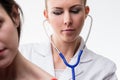 Doctor's careful auscultation during checkup