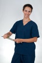 Healthcare professional in blue scrubs