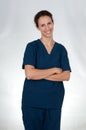 Healthcare professional in blue scrubs