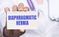 The healthcare professional is holding a diaphragmatic hernia card