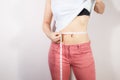 Healthcare and woman diet lifestyle concept to reduce belly and shape up healthy stomach muscle Royalty Free Stock Photo