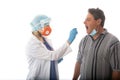 Healthcare worker swabbing a patient for respiratory viruses COVID-19  or flu Royalty Free Stock Photo