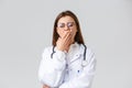 Healthcare workers, medicine, insurance and covid-19 pandemic concept. Young doctor in white scrubs, female physician Royalty Free Stock Photo