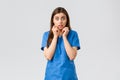 Healthcare workers, prevent virus, insurance and medicine concept. Concerned and scared female nurse hear bad rumor or