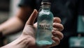 Healthy adult pouring fresh water from transparent bottle outdoors exercising generated by AI