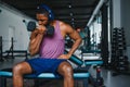 healthy african man working out with dumbbells in gym. Royalty Free Stock Photo