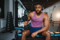 healthy african man working out with dumbbells in gym. Royalty Free Stock Photo