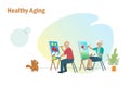 Healthy aging, senior lifestyle. Happy elderly couple painting canvas for relaxation and recreation activities