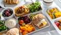 Healthy airplane meal with fresh ingredients served on a tray table, emphasizing nutritious in-flight dining options Royalty Free Stock Photo