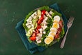 Healthy American Cobb salad with egg bacon avocado chicken tomato. hearty keto low carb diet Royalty Free Stock Photo