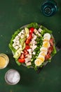 Healthy American Cobb salad with egg bacon avocado chicken tomato. hearty keto low carb diet Royalty Free Stock Photo