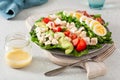 healthy American Cobb salad with egg bacon avocado chicken tomato. hearty keto low carb diet Royalty Free Stock Photo