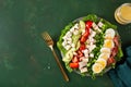 healthy American Cobb salad with egg bacon avocado chicken tomato. hearty keto low carb diet Royalty Free Stock Photo