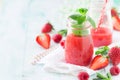 Healthy red fruit smoothie with strawberries