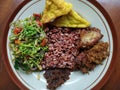 Healthy asian food, Red Rice with papaya flowers and fried chicken