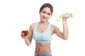 Healthy Asian girl diet with tomato juice and measuring tape on Royalty Free Stock Photo