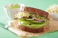 Healthy avocado sandwich with cucumber alfalfa sprouts onion Royalty Free Stock Photo