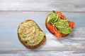 Healthy avocado sandwich , dark bread.