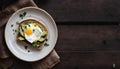 Healthy Avocado Toast with Poached Egg on Wooden Table, Copy Space