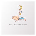 Healthy baby sleep at night. Child sleep on pillow under blanket, crib with mobile